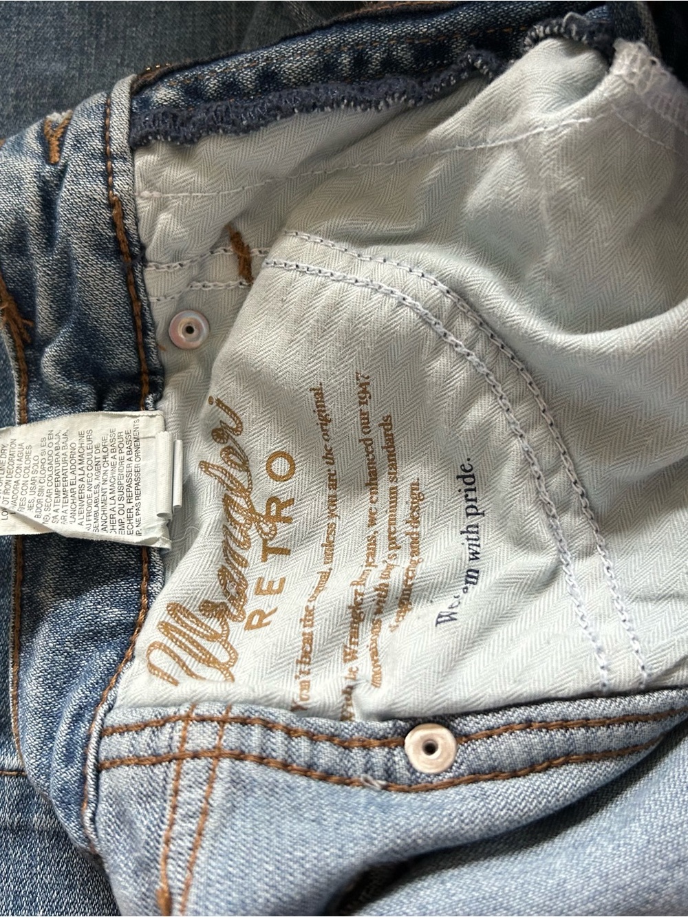 Wrangler Light Blue Denim Jeans with Gold Stitching
